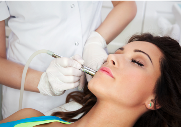 Esthetician doing a procedure to a patient