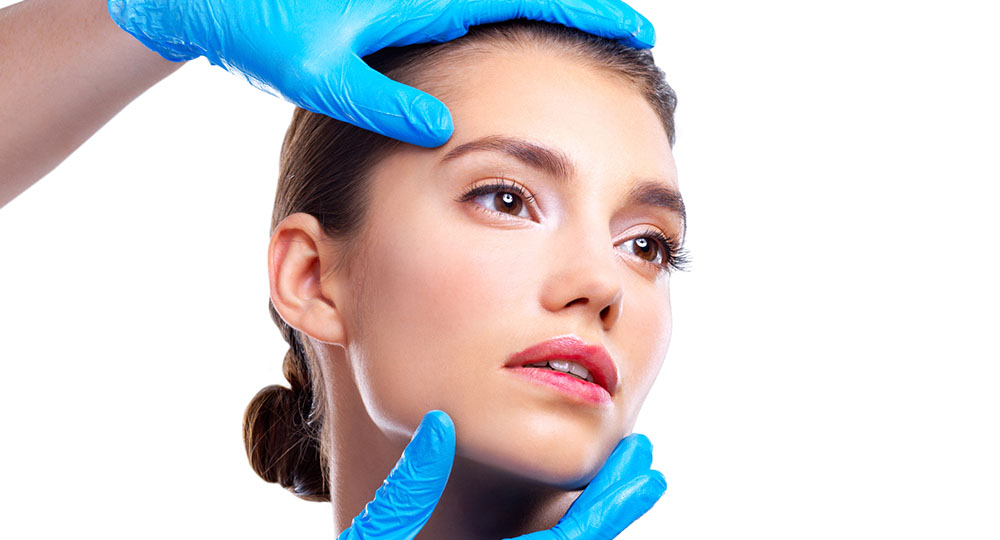 Close-up of a woman's face during a cosmetic procedure